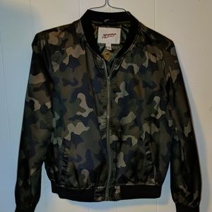 A camouflage bomber jacket